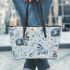 Cute pastel blue bunnies and floral pattern leather tote bag