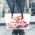 Cute pink car with a cute puppy inside leather tote bag