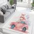 Cute pink owl sitting on top of a pastel car area rugs carpet