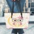 Cute pink owl with a bow and glasses sitting on the moon leather tote bag