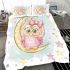 Cute pink owl with a bow and glasses sitting on the moon bedding set