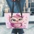 Cute pink owl with a bow on its head leather tote bag