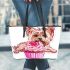 Cute pink yorkshire terrier in a cupcake leather tote bag