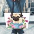 Cute pug dog inside a flower bucket leather tote bag