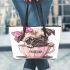 Cute pug puppy with a pink bow on its head leather tote bag