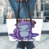 Cute purple frog wearing crown with blue skin color leaather tote bag