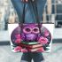 Cute purple owl sitting on top of books surrounded leather tote bag