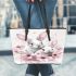 Cute white bunnies with pink flowers leather tote bag