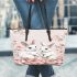 Cute white bunnies with pink flowers leather tote bag