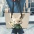 Cute white rabbit holding daisies leather tote bag