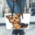 Cute yorkshire terrier in the style of digital cartoon leather tote bag