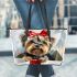 Cute yorkshire terrier inside a large gift box leather tote bag