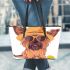 Cute yorkshire terrier wearing summer leather tote bag