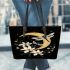 Dragonflies on the moon leather tote bag