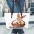 Easter bunny with a basket full of easter eggs leather tote bag