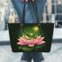 Frog jumping on a pink lotus flower leaather tote bag