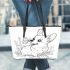 Happy corgi with a butterfly on its nose in a garden leather tote bag