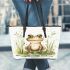 Happy frog sitting in the grass near a pond leaather tote bag