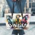 Painting of three horses running in the same direction leather tote bag