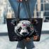 Panda with black and white fur and colorful floral leather tote bag