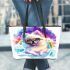 Pomeranian dog wearing sunglasses watching the rainbow leather tote bag