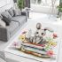 Rabbit sitting on top of books surrounded by flowers area rugs carpet