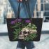 Skull with green frog on top and purple thistle flowers growing leaather tote bag