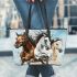 Three horses galloping in the wind leather tote bag