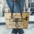 Trumpet and music notes and dream catcher leather tote bag