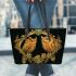 Two colorful owls with yellow feathers leather tote bag