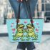 Two cute cartoon frogs in love leaather tote bag