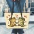 Two cute cartoon frogs in love leaather tote bag