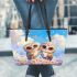 Two cute owls sitting on flowers with colorful butterflies leather tote bag