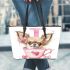 Valentine teacup chihuahua in pink and brown leather tote bag