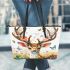 White tailed deer with large antlers and flowers on its head leather totee bag