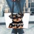 Yorkshire terrier puppy in a full body pose leather tote bag