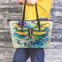 Abstract dragonfly with swirls and flowers leather tote bag