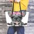 Adorable grey french bulldog puppy wearing pink roses leather tote bag