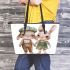 Adorable happy baby bunny couple in green leather tote bag