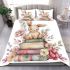 Baby rabbit sitting on top of books surrounded by flowers bedding set