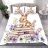 Baby rabbit sitting on top of books surrounded by flowers bedding set