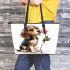 Beagle puppy holding a pink rose in its mouth leather tote bag