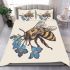 Bee with a blue flower on its back bedding set