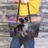 Black and white border collie in the foreground leather tote bag
