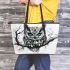 Black and white owl with bright teal eyes leather tote bag