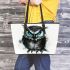 Black and white owl with bright teal eyes leather tote bag