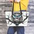 Black and white owl with bright teal eyes leather tote bag