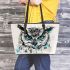 Black and white owl with teal highlights leather tote bag