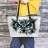 Black and white owl with turquoise highlights leather tote bag