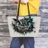 Black and white owl with turquoise highlights leather tote bag